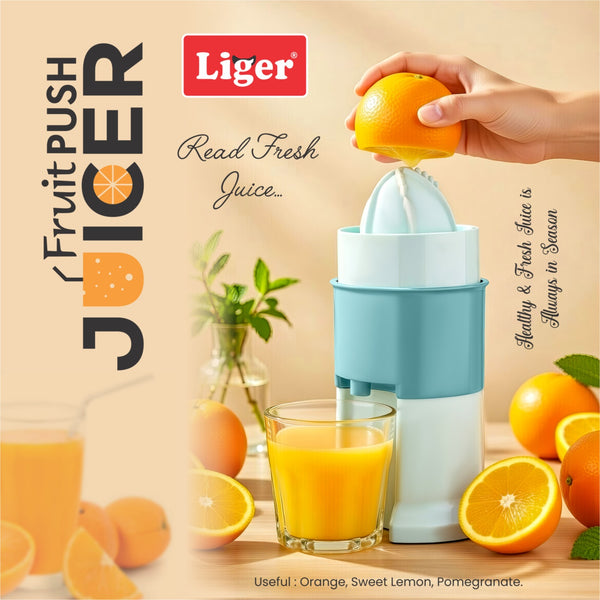 Liger fruit push juicer with oranges and juice on a wooden surface